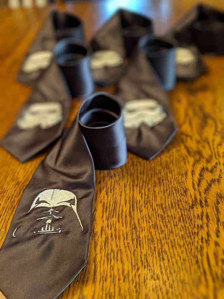 A group of custom Custom Wedding Ties on a table.