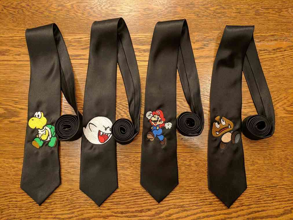 Four Custom Wedding Ties with Nintendo characters on them.