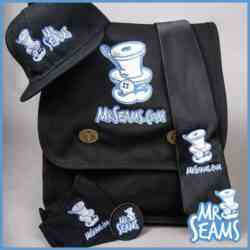 A black backpack with a hat and a hat.