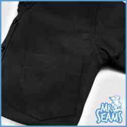 A black shirt with a pocket on it. Introducing the MrSeams - Custom Shirt with Pocket.