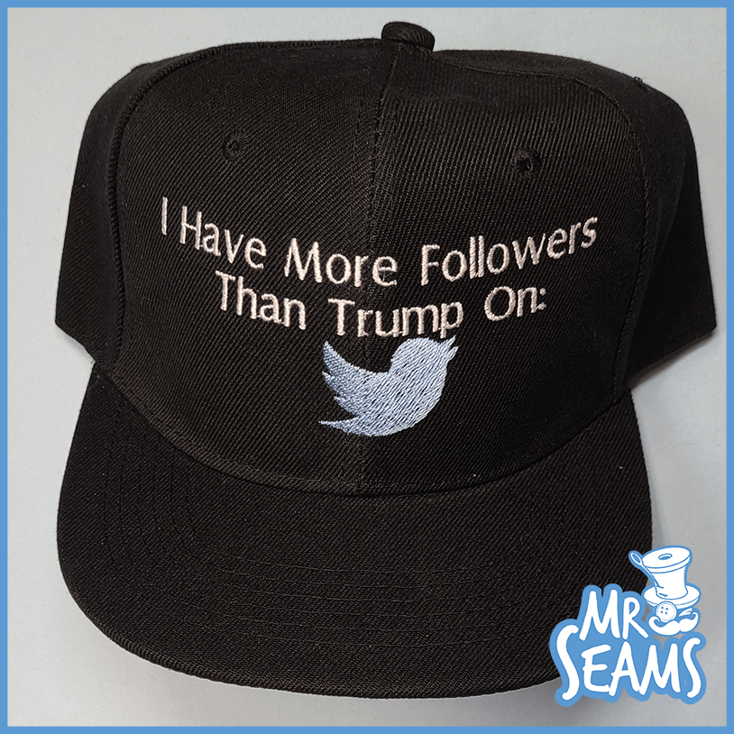 A trendy I have more followers than Trump Hats & Beanies that proudly displays the message "I have more followers than Trump" in bold letters, perfect for anyone looking to make a statement.