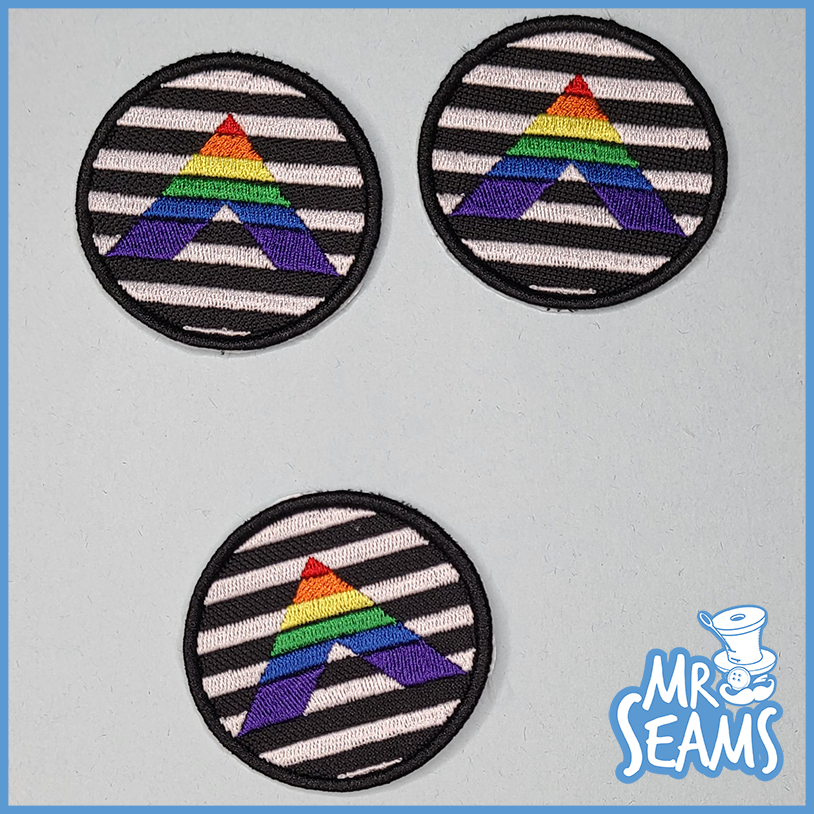 Mr. Seams proudly presents the Pride Triangle Patches, featuring a vibrant rainbow design. These patches are a symbol of unity and pride for the LGBTQ+ community.