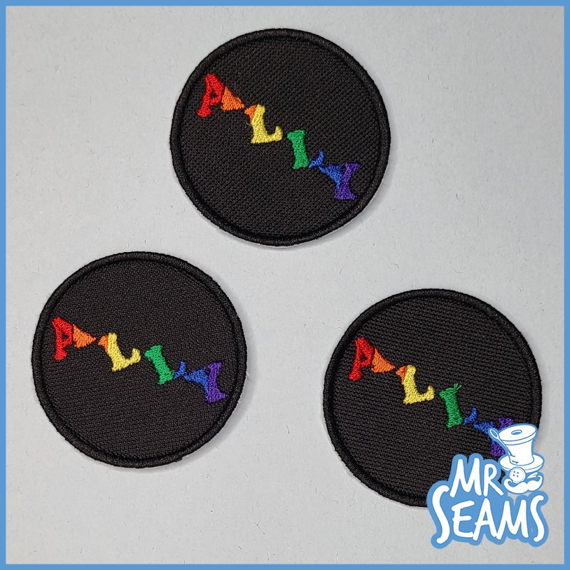Mr. Sean's Pride Triangle Patches.