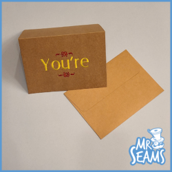 A brown envelope with the Sew About Your Grammar Greetings Cards on it.