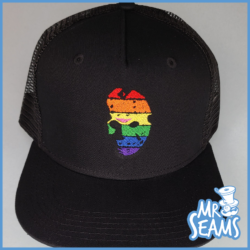 A black Jason Voorhees Pride beanie or hat with an image of a rainbow face on it.