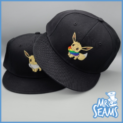 eevee pride beanies & hats