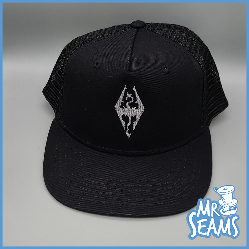 A Skyrim Pride beanies & hats with a black color and a white logo on it.