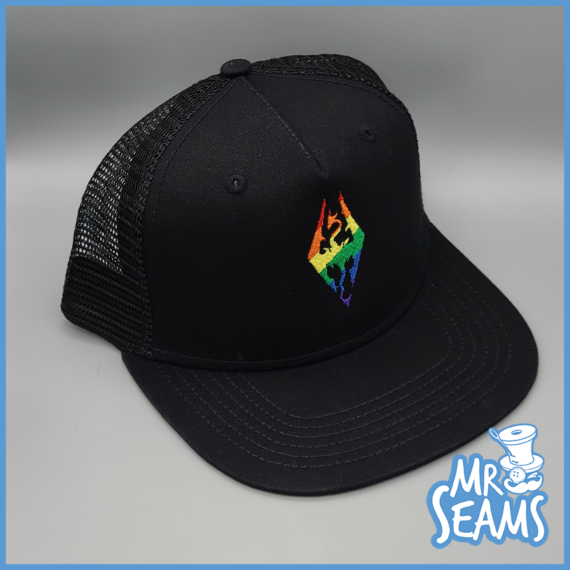 A black hat with a rainbow logo on it from the Skyrim Pride Beanies & Hats collection. Product Name: Skyrim Pride Beanies & Hats