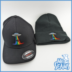 Black baseball cap and beanie with rainbow UFO design.