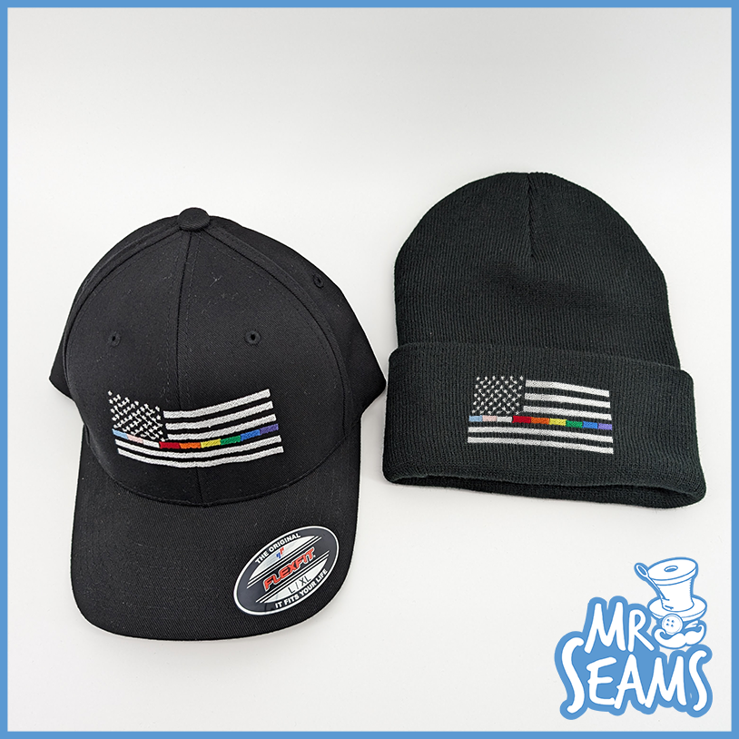 Black caps with colorful flag design.