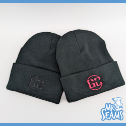 Two black beanies with embroidered logos.