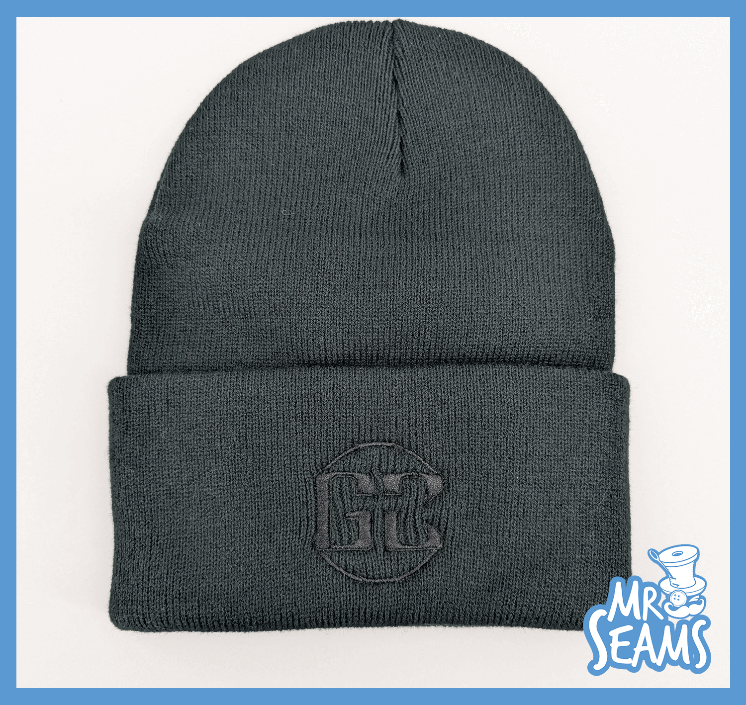 Gray beanie with embroidered logo and cuff.