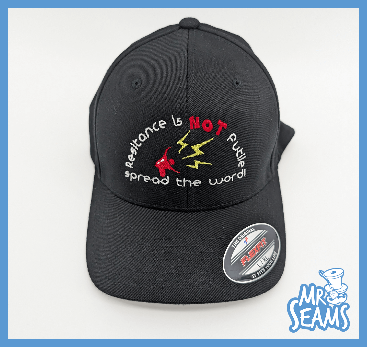 Black cap with embroidered motivational text.