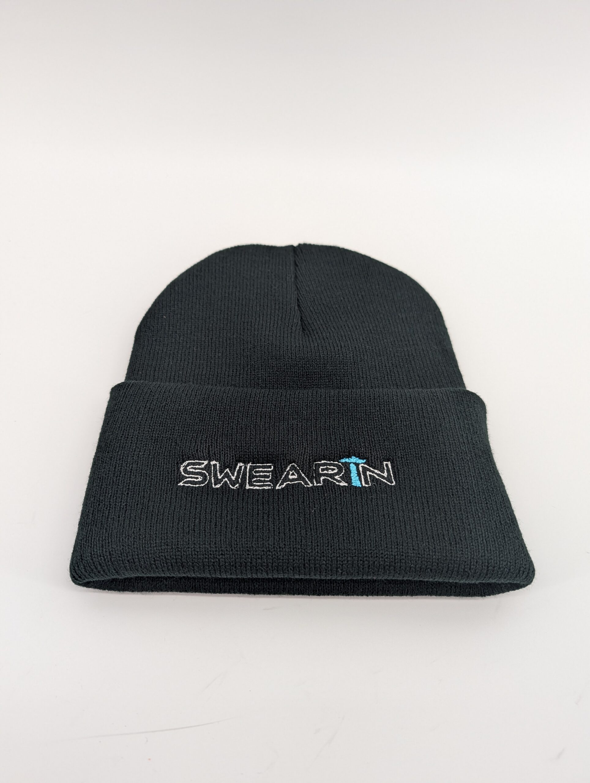 Black beanie with "Swearin" embroidered text.